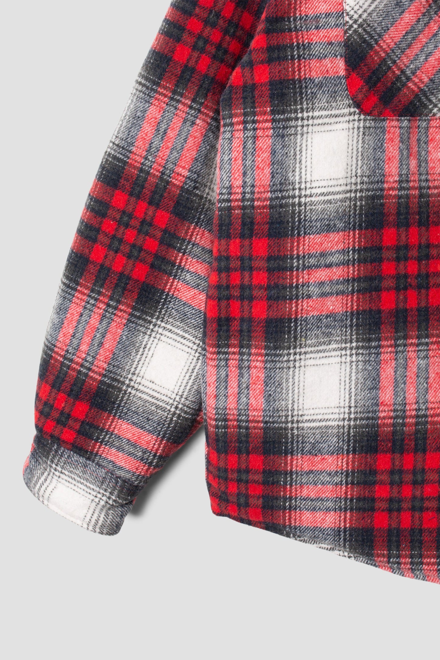 Sleeve detail of Stan Ray Quilted Plaid Overshirt in red plaid