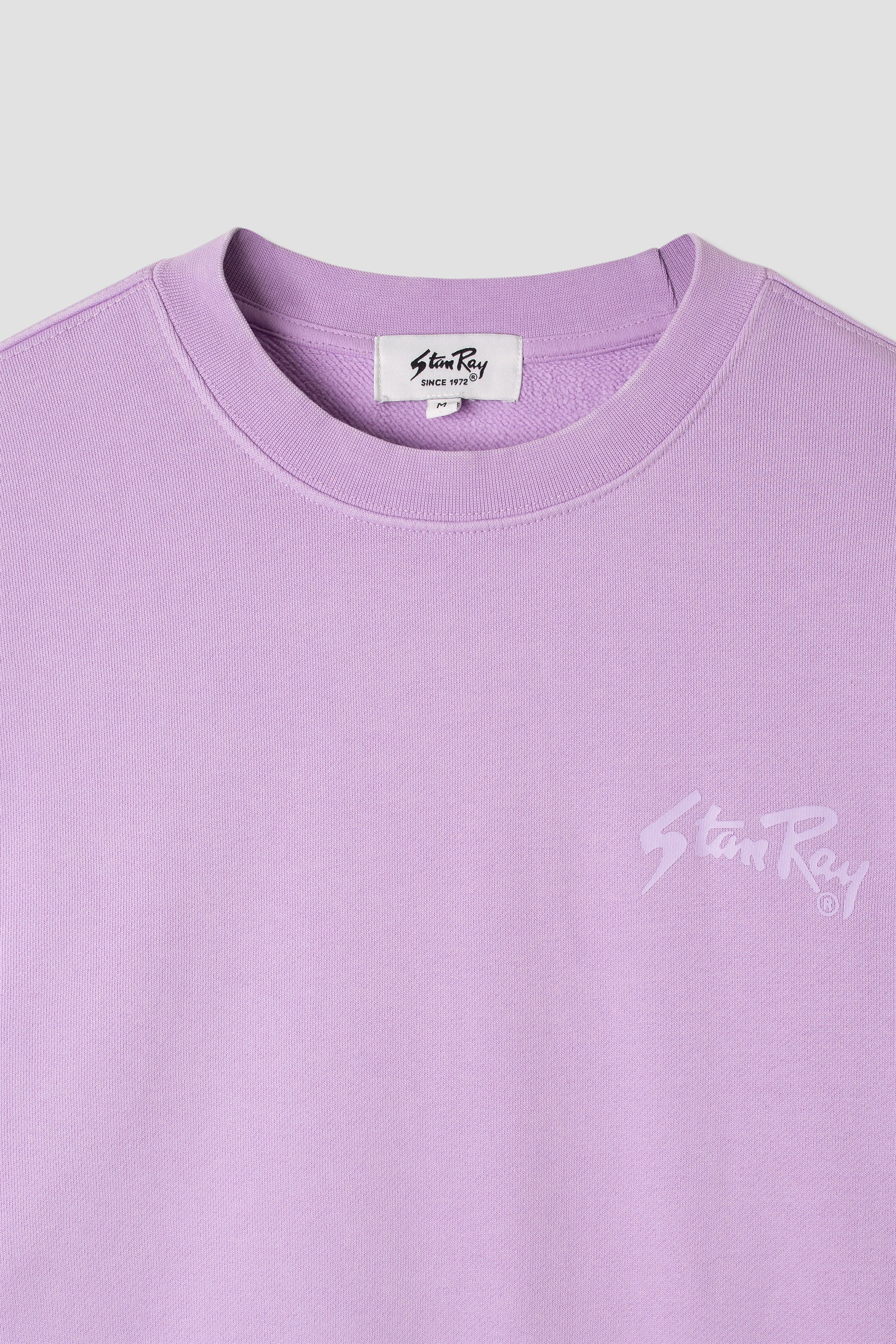 Close-up of Stan Ray logo on OG Crew in washed purple