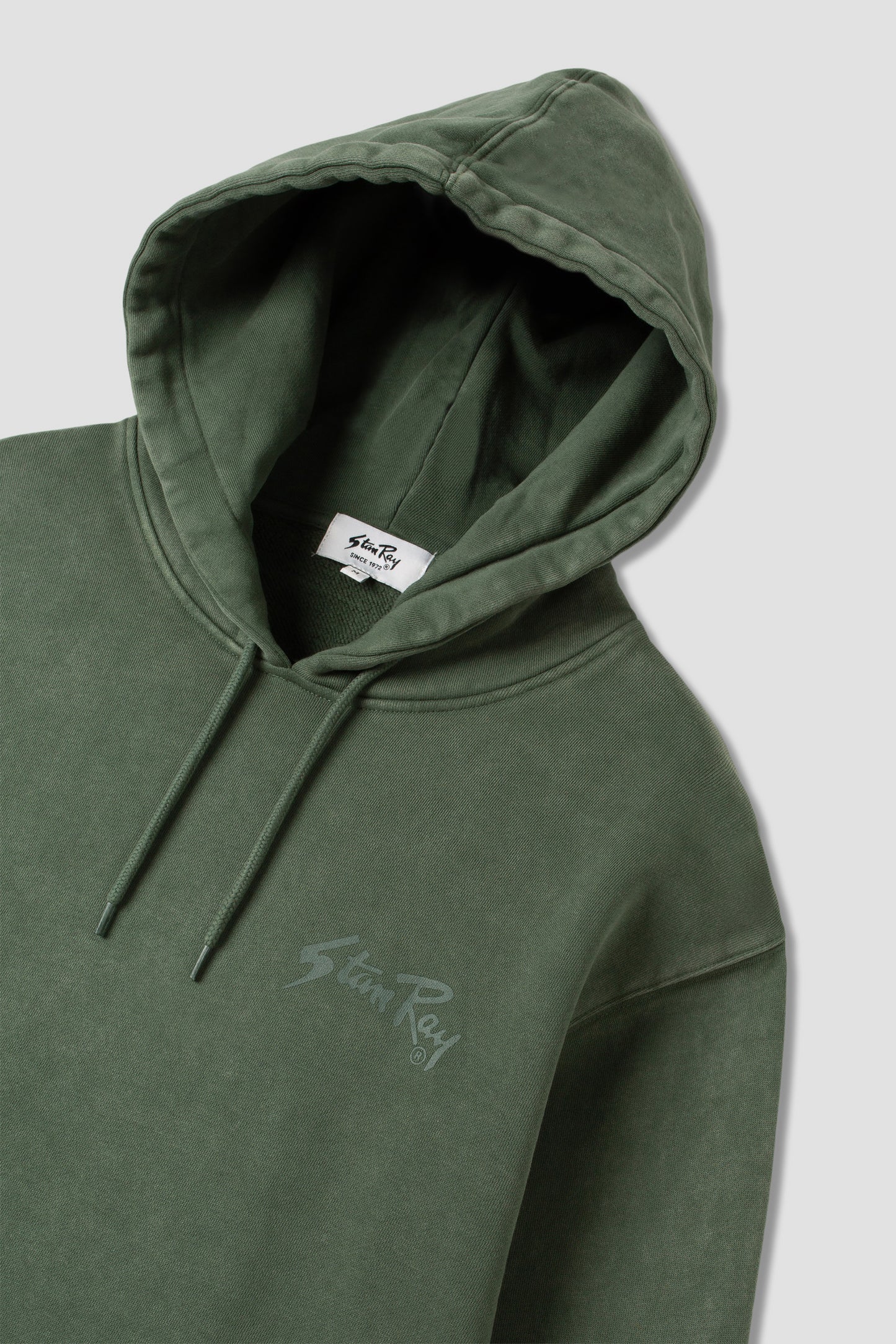 Angled view of Stan OG Hood with tonal print