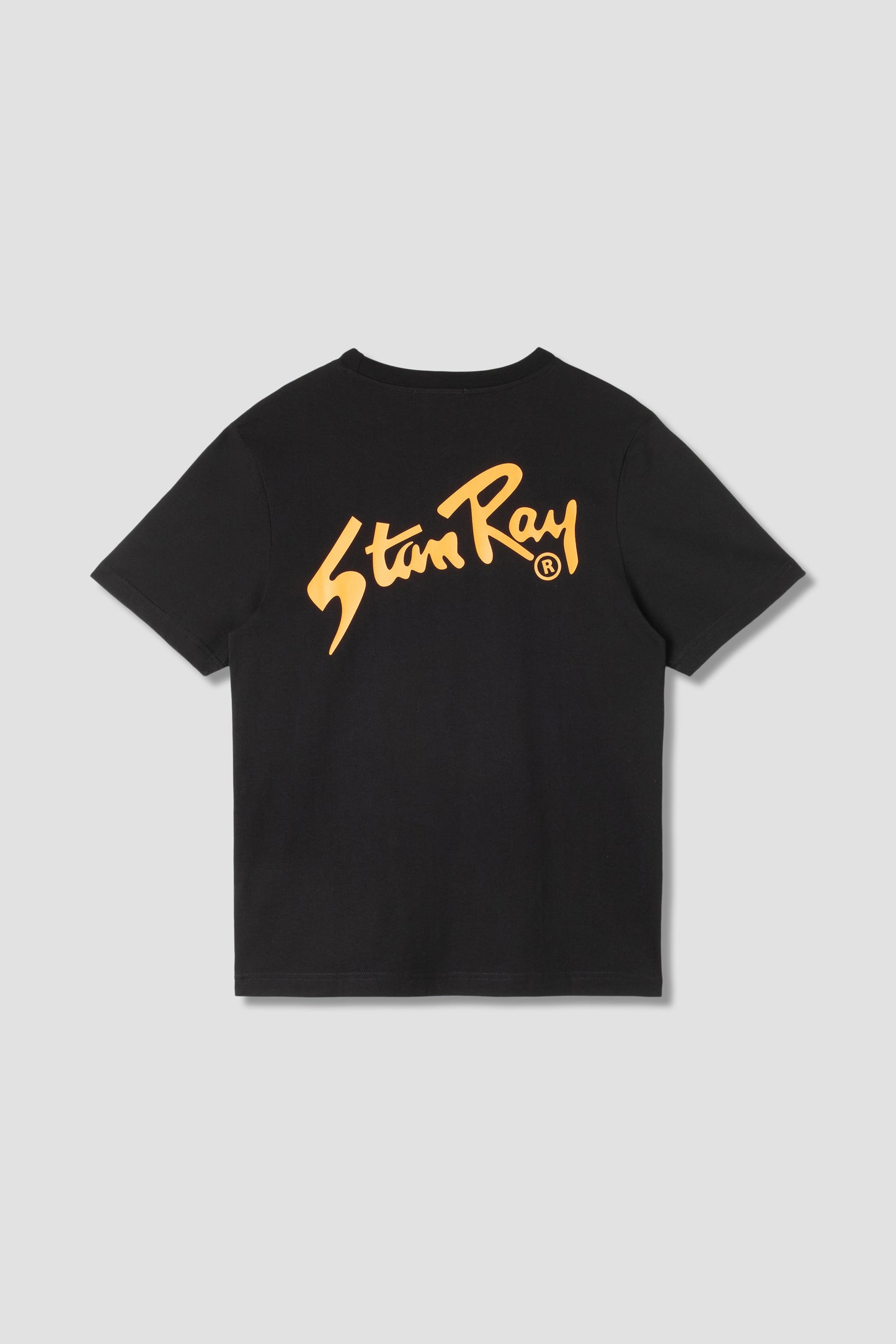 Stan OG Tee back view, black with orange print