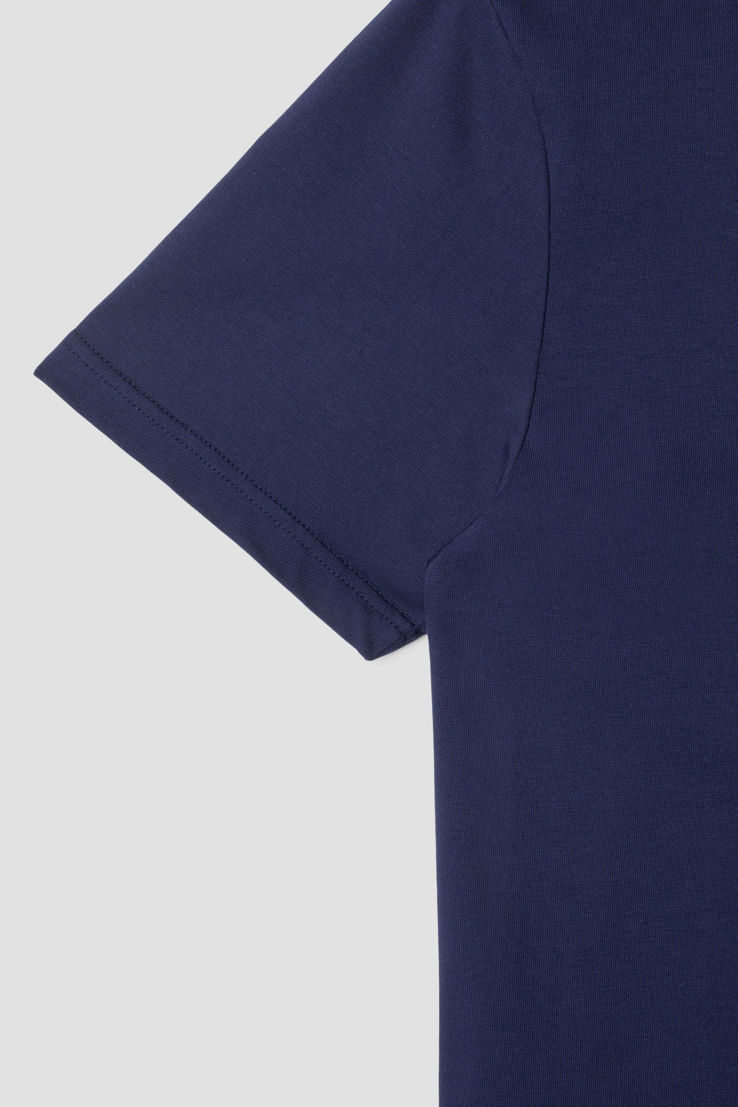 Detail of sleeve on Stan OG Tee in navy