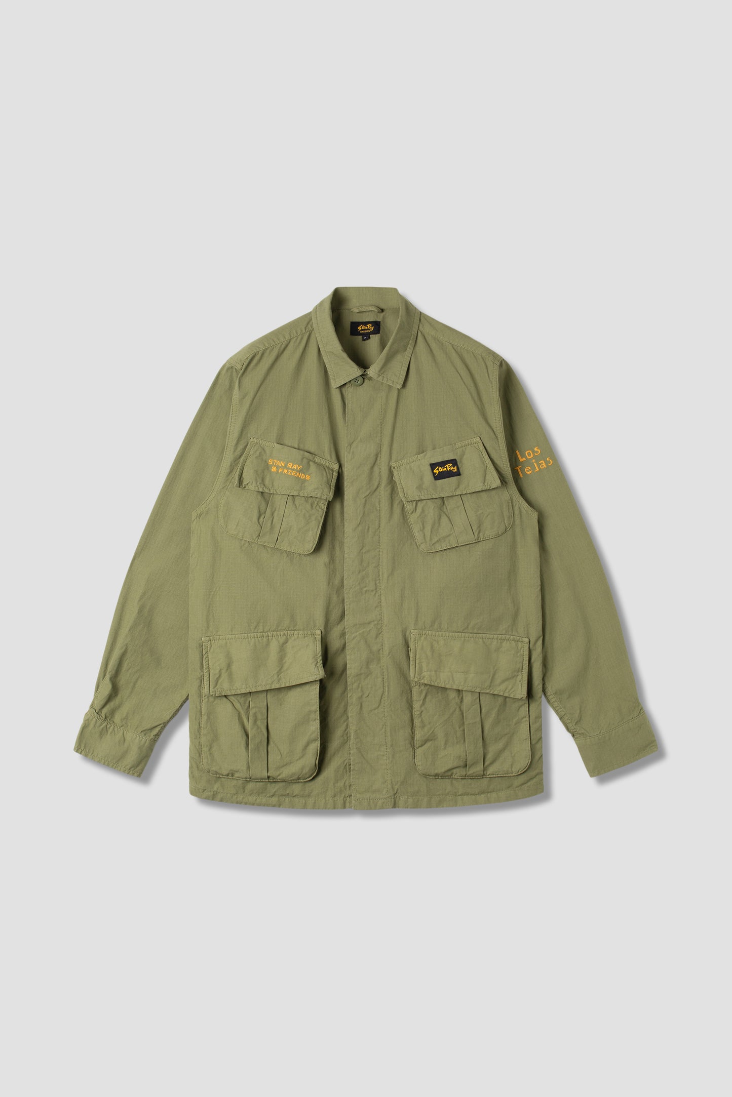 Front view of olive ripstop tropical jacket with pockets