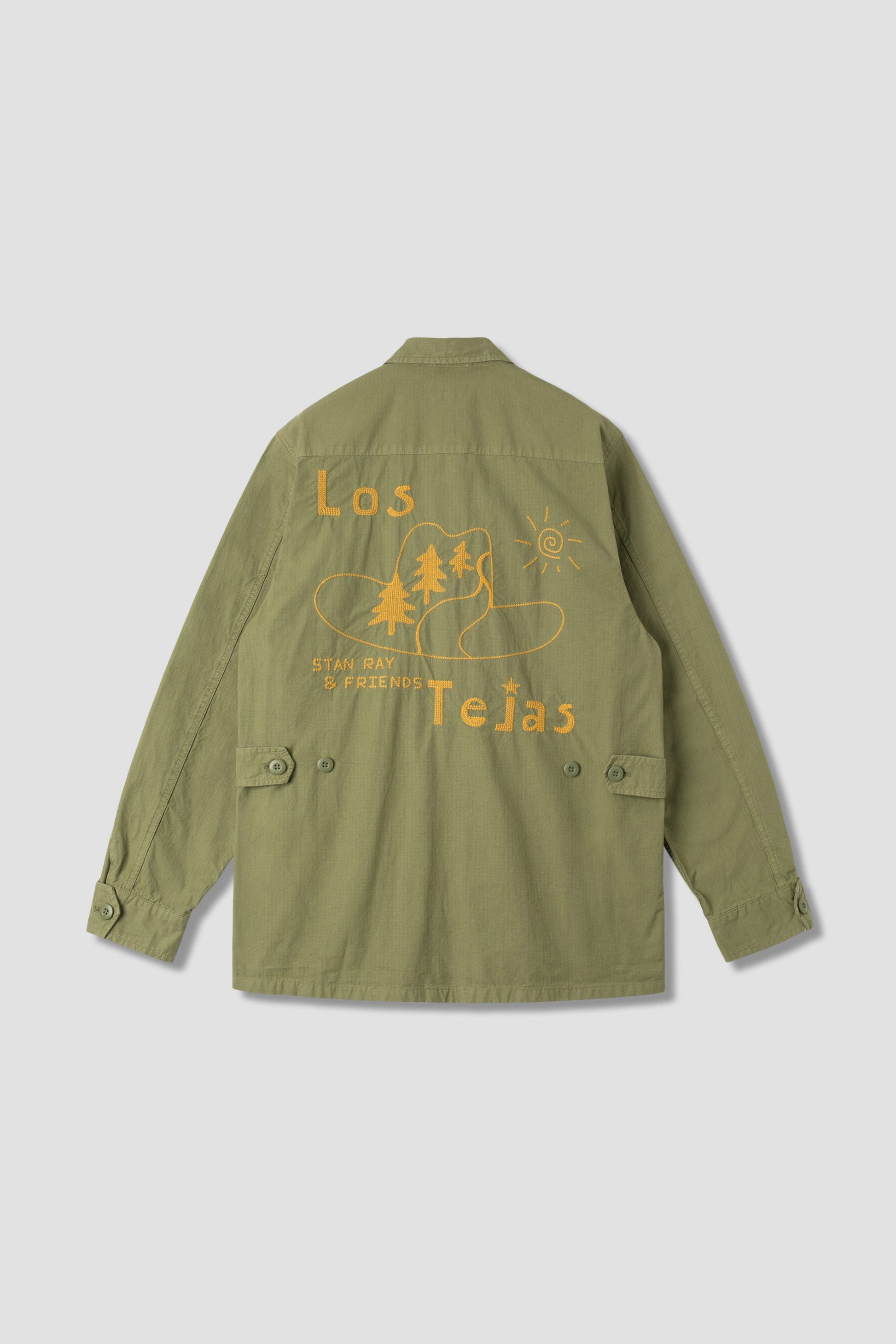 Back view of olive jacket with Los Tejas print