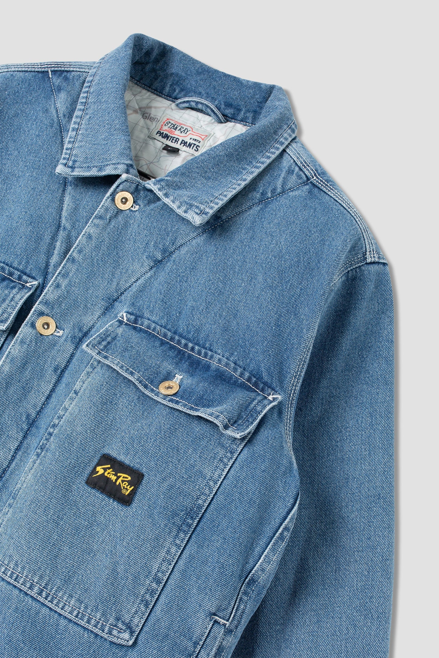 Front pocket detail on Stan Ray Trucker Jacket, stone wash denim.