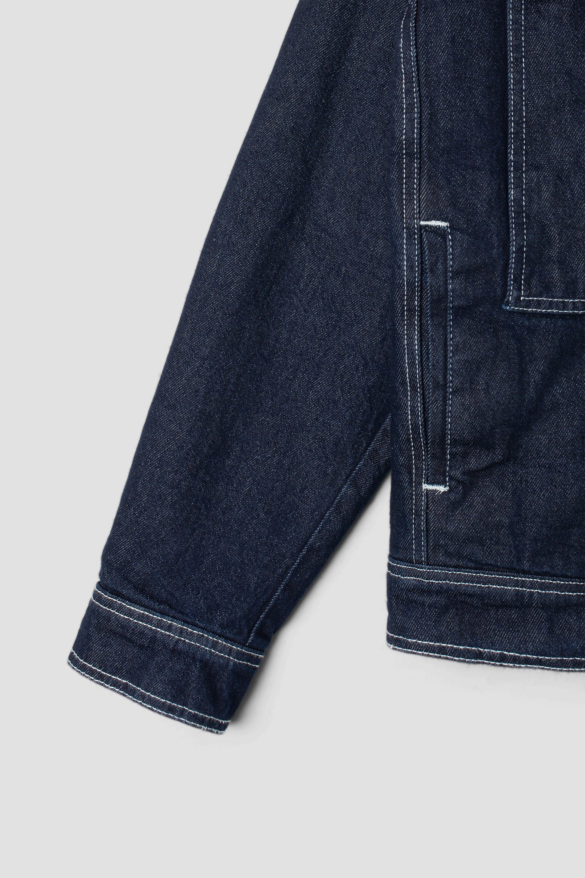 Sleeve detail of Stan Ray Trucker Jacket in single rinse denim.