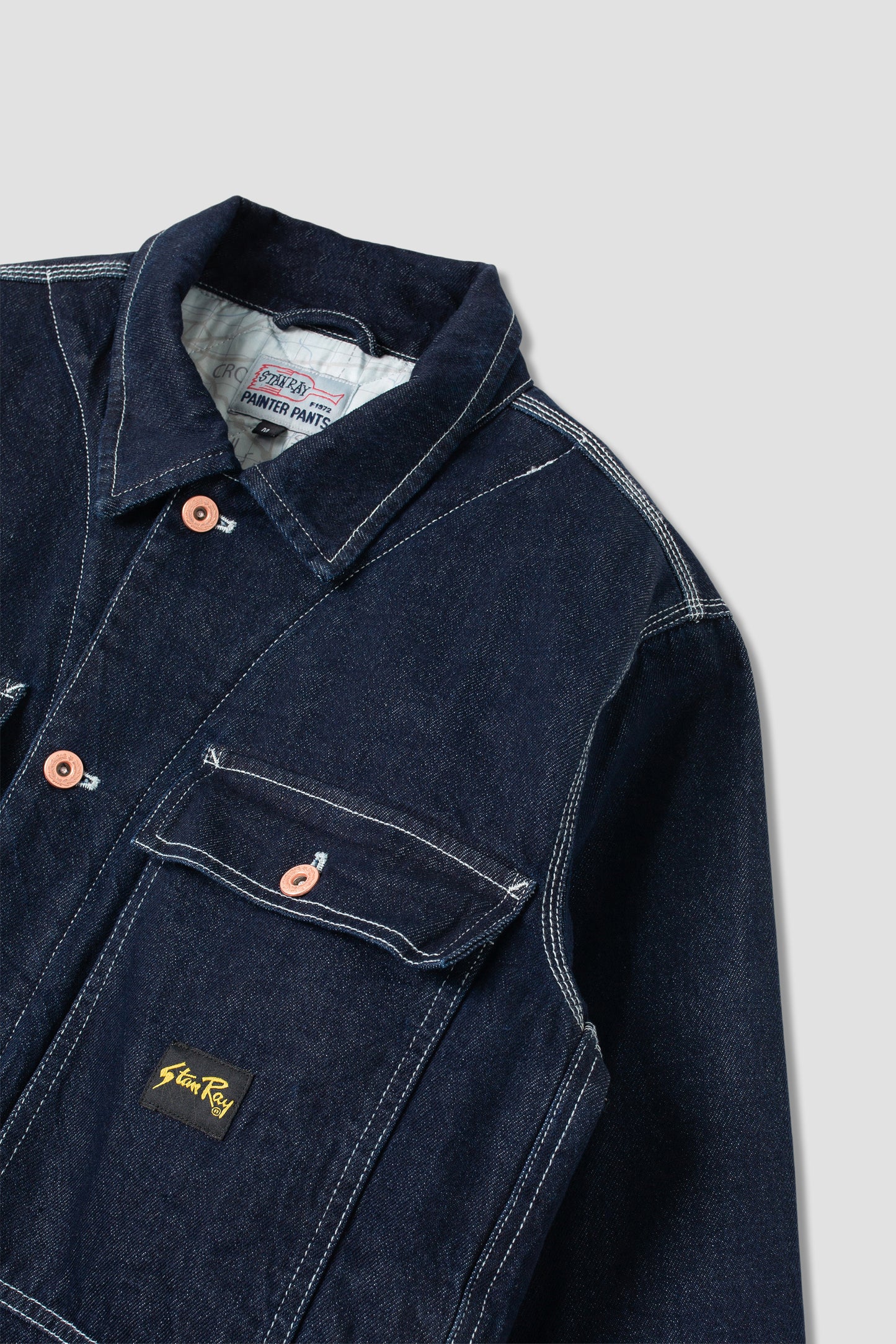 Front pocket detail on Stan Ray Trucker Jacket in denim.