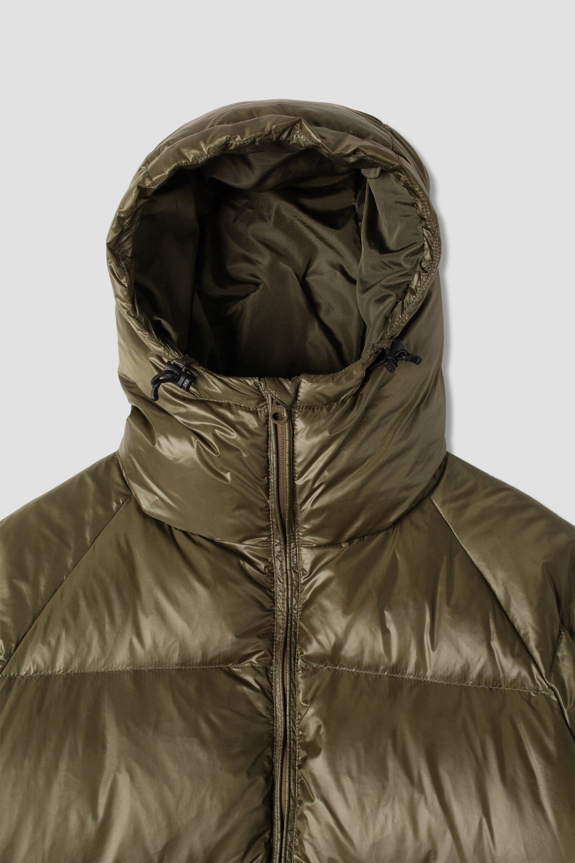 Hood and zipper detail of olive ultralight parka