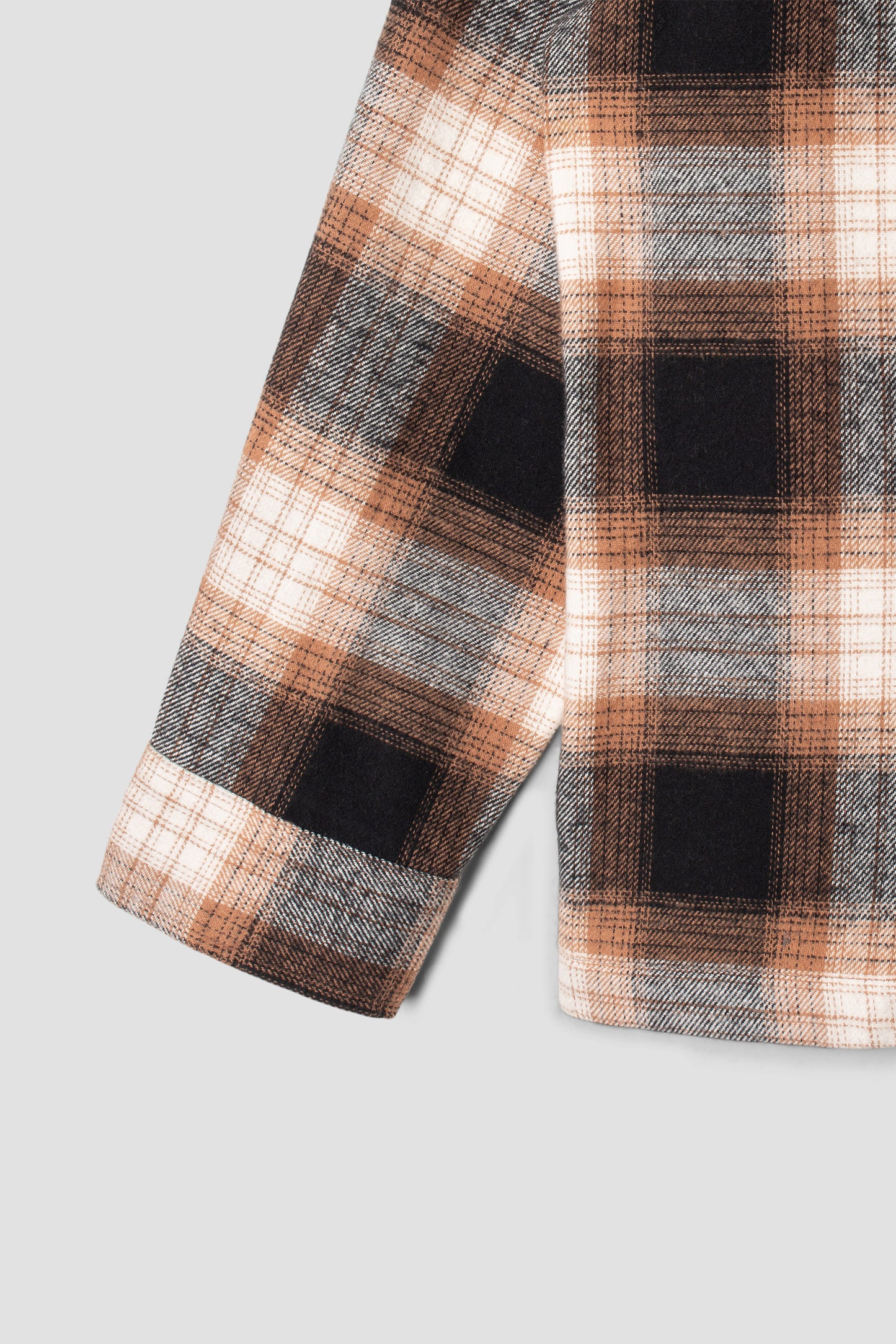 Detail of sleeve on Stan Ray Zip Shirt in brown plaid